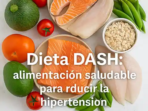 Imagen de una mesa con frutas, verduras, pescado y legumbres representando la dieta DASH como modelo alimentario saludable para la hipertensión y el bienestar general.